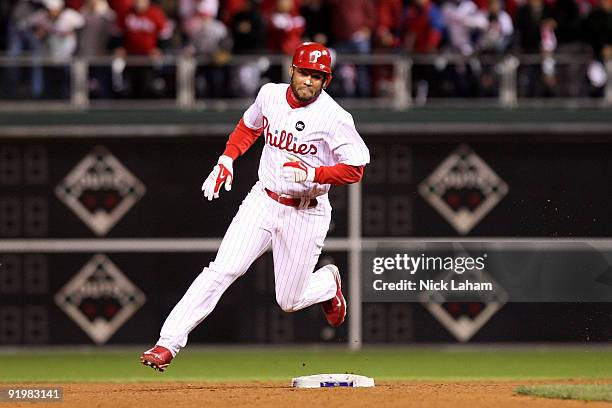 Pedro Feliz of the Philadelphia Phillies rounds second on his way for third for a triple in the fifth inning against the Los Angeles Dodgers in Game...