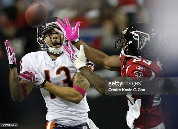 Center back Chris Houston of the Atlanta Falcons breaks up a pass tended for wide receiver Johnny Knox of the Chicago Bears in the second quarter of...
