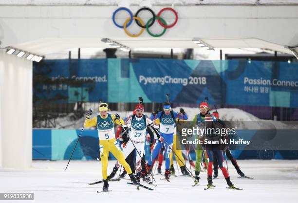 Sebastian Samuelsson of Sweden leads a pack during the Men's 15km Mass Start Biathlon on day nine of the PyeongChang 2018 Winter Olympic Games at...