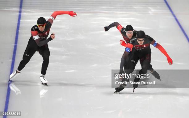 Pyeongchang- FEBRUARY 18 - Team Canada, Jordan Belchos, white armband, Ted-Jan Bloemen, red armband and Denny Morrison, blue armband, start in the...
