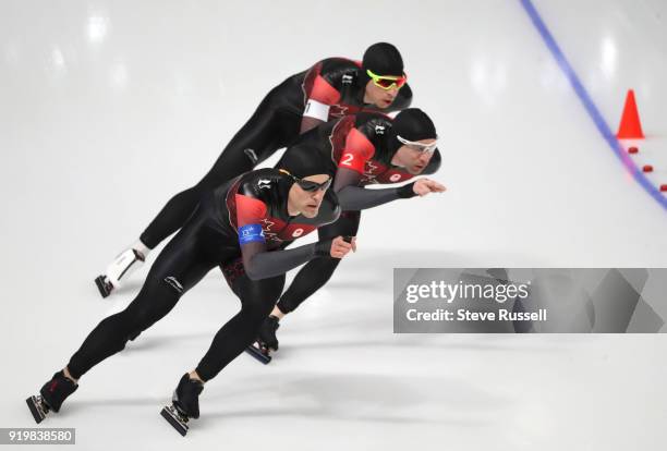 Pyeongchang- FEBRUARY 18 - Team Canada, Jordan Belchos, white armband, Ted-Jan Bloemen, red armband and Denny Morrison, blue armband, compete in the...