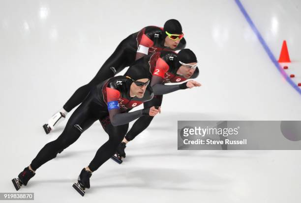 Pyeongchang- FEBRUARY 18 - Team Canada, Jordan Belchos, white armband, Ted-Jan Bloemen, red armband and Denny Morrison, blue armband, compete in the...