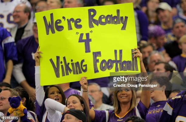 Fans of quarterback Brett Favre of the Minnesota Vikings display signs in his support against the Baltimore Ravens during NFL action at Hubert H....