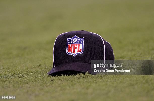 An officials cap marks a play as the Minnesota Vikings face the Baltimore Ravens during NFL action at Hubert H. Humphrey Metrodome on October 18,...