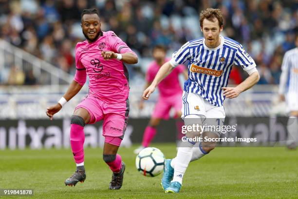 Cheick Doukoure of Levante, David Zurutuza of Real Sociedad during the La Liga Santander match between Real Sociedad v Levante at the Estadio Anoeta...