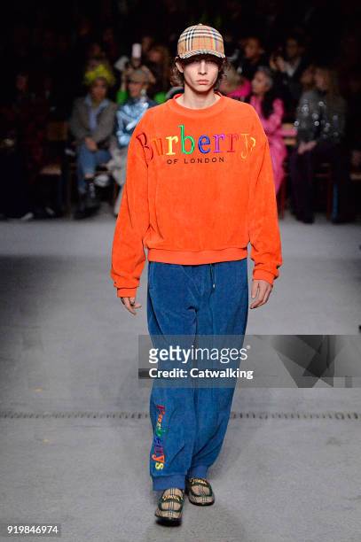 Model walks the runway at the Burberry Prorsum Autumn Winter 2018 fashion show during London Fashion Week on February 17, 2018 in London, United...