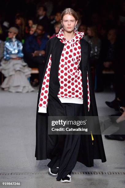 Model walks the runway at the Burberry Prorsum Autumn Winter 2018 fashion show during London Fashion Week on February 17, 2018 in London, United...