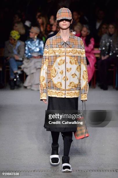 Model walks the runway at the Burberry Prorsum Autumn Winter 2018 fashion show during London Fashion Week on February 17, 2018 in London, United...
