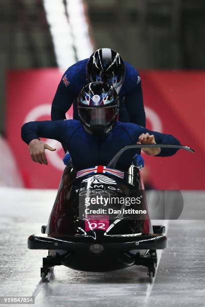 Brad Hall and Joel Fearon of Great Britain slide during two-man Bobsleigh heats on day nine of the PyeongChang 2018 Winter Olympic Games at Olympic...