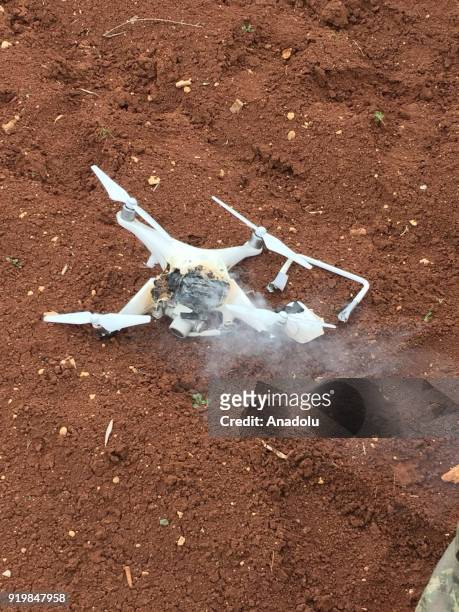 Photo taken from Syria's Afrin region shows the destroyed unmanned aerial vehicle , also known as "drone" of PYD/PKK terror group is seen on the...