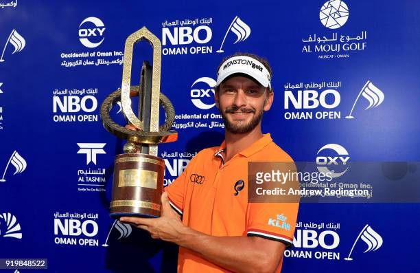 Joost Luiten of the Netherlands celebrates with the winners trophy after the final round of the NBO Oman Open at Al Mouj Golf on February 18, 2018 in...