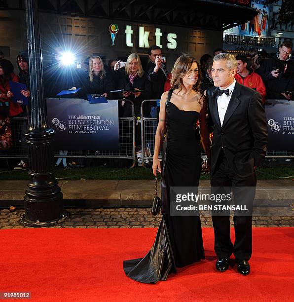 Actor George Clooney and Italian model and actress Elisabetta Canalis arrive for the world premiere of "Fantastic Mr Fox" and the opening gala of The...