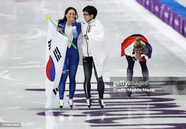 Nao Kodaira of Japan, Sang-Hwa Lee of Korea and Karolina Erbanova of the Czech Republic celebrate after winning medals during the Ladies' 500m...