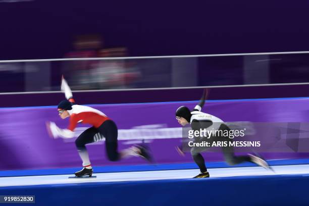 Czech Republic's Karolina Erbanova and Japan's Nao Kodaira compete in the women's 500m speed skating event during the Pyeongchang 2018 Winter Olympic...
