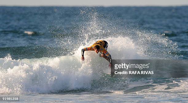 Brazilian surfer, Adriano de Souza surfs to win the ASP Billabong pro Mundaka surfing world championships finals, on October 13 in the northern...