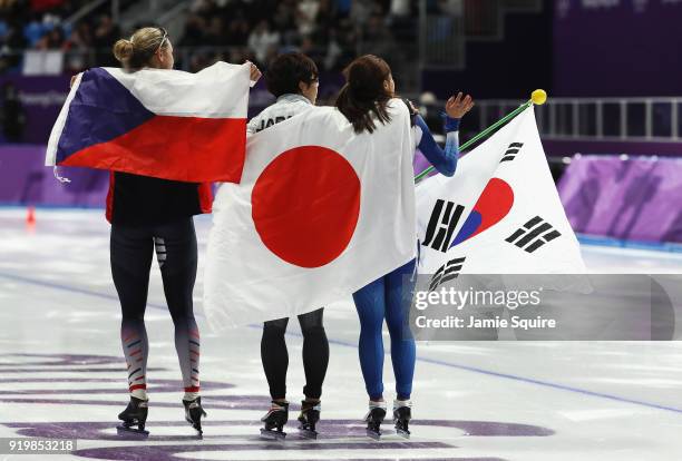 Bronze medalist Karolina Erbanova of the Czech Republic, gold medalist Nao Kodaira of Japan and silver medalist Sang-Hwa Lee of Korea celebrate after...