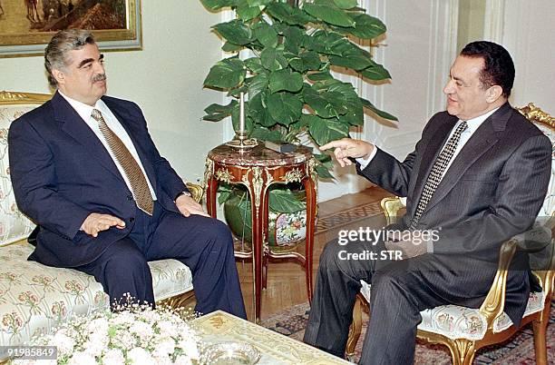 Egyptian President Hosni Mubarak meets with Lebanese Prime Minister Rafic Hariri in Cairo 21 April. Hariri is on a two day visit to Egypt to for...