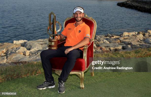 Joost Luiten of the Netherlands celebrates with the winners trophy after the final round of the NBO Oman Open at Al Mouj Golf on February 18, 2018 in...