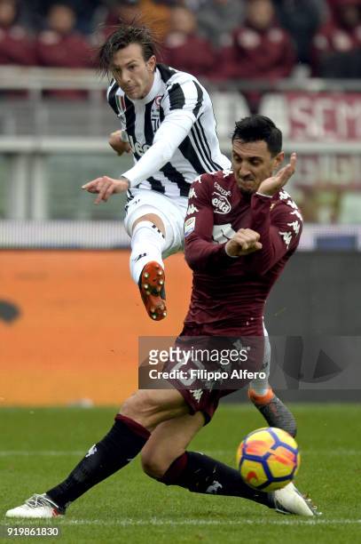 Federico Bernardeschi of Juventus and Nicolas Burdisso of Torino during the serie A match between Torino FC and Juventus at Stadio Olimpico di Torino...