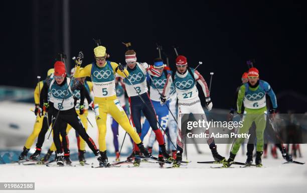 The Athletes compete during the Men's 15km Mass Start Biathlon on day nine of the PyeongChang 2018 Winter Olympic Games at Alpensia Biathlon Centre...