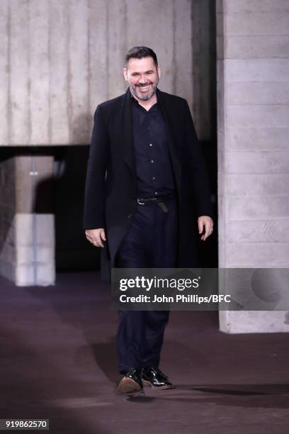 Fashion designer Roland Mouret is seen on the runway at the Roland Mouret show during London Fashion Week February 2018 at The National Theatre on...