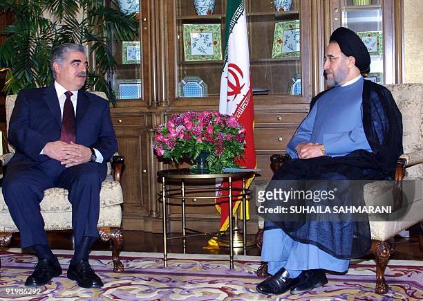 Iranian President Mohammad Khatami meets with Lebanese Prime Minister Rafic Hariri at Phoenicia hotel in Beirut 12 May 2003. The reformist Iranian...