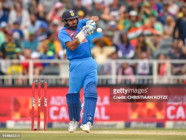 Indian batsman Rohit Sharma plays a shot during the 1st T20I cricket match between South Africa and India at Wanderers cricket stadium in...