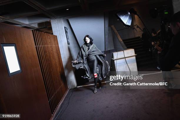 Model backstage ahead of the Roland Mouret show during London Fashion Week February 2018 at The National Theatre on February 18, 2018 in London,...