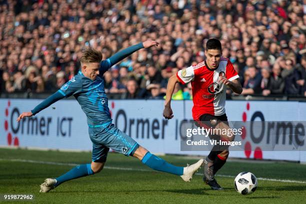 Sebastian Jakubiak of Heracles Almelo, Kevin Diks of Feyenoord during the Dutch Eredivisie match between Feyenoord Rotterdam and Heracles Almelo at...