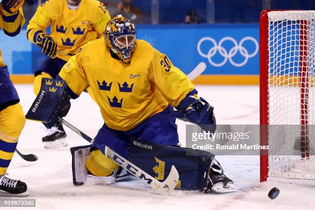 Viktor Fasth of Sweden makes a save in the third period against Finland during the Men's Ice Hockey Preliminary Round Group C game on day nine of the...