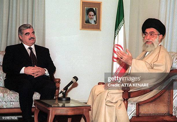 Lebanese Prime Minister Rafiq Hariri meets with Iran's Supreme Leader Ayatollah Ali Khamenei 13 January 2001 in Tehran. Hariri arrived for a two-day...