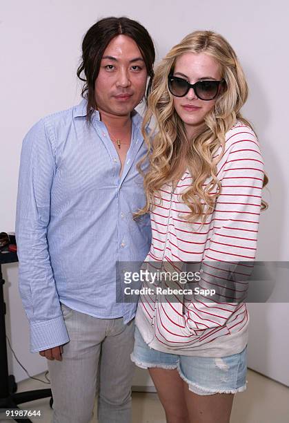 Stylist/Owner Byron Williams and Actress Riley Keough attend The Byron & Tracey Lounge held at Byron & Tracey Salon on May 29, 2009 in Beverly Hills,...