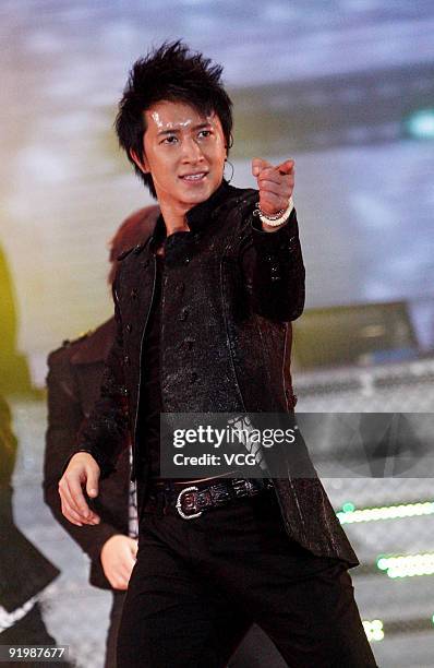 Hankyun of South Korea boy band Super Junior performs on stage during their concert at Yuanshen Sports Centre Stadium on October 18, 2009 in Shanghai...