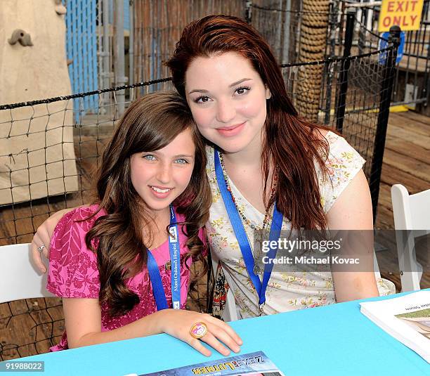 Actresses Ryan Newman and Jennifer Stone sign autographs at the Mattel And Children's Hospital UCLA's "Party On The Pier" at Santa Monica Pier on...