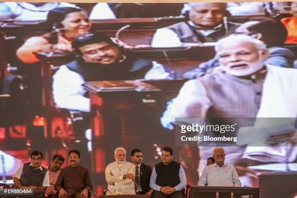 Narendra Modi, India's prime minister, center, attends a ceremony at the site of the new Navi Mumbai International Airport in Navi Mumbai, India, on...