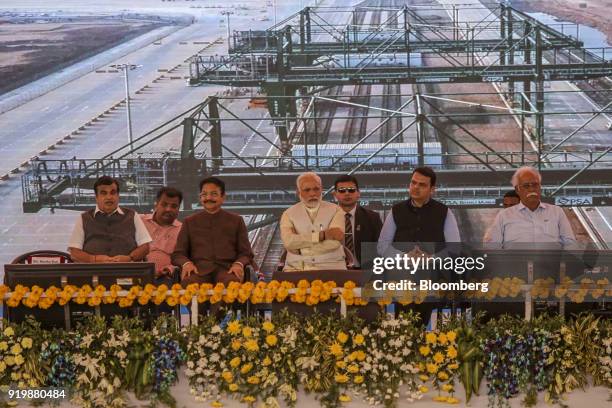 Narendra Modi, India's prime minister, center, attends a ceremony at the site of the new Navi Mumbai International Airport in Navi Mumbai, India, on...