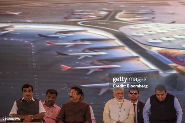 Narendra Modi, India's prime minister, third from right, attends a ceremony at the site of the new Navi Mumbai International Airport in Navi Mumbai,...