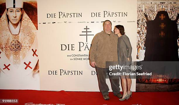 Actress Johanna Wokalek and actor John Goodman attend the photocall of 'Pope Joan' at Hotel Ritz Carlton on October 19, 2009 in Berlin, Germany.