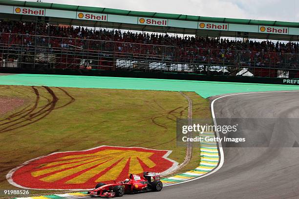 Giancarlo Fisichella of Italy and Ferrari drives during the Brazilian Formula One Grand Prix at the Interlagos Circuit on October 18, 2009 in Sao...