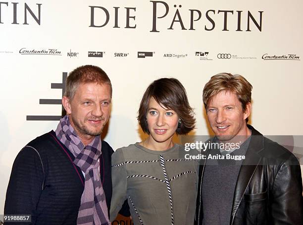 Director Soenke Wortmann, actress Johanna Wokalek and actor David Wenham attend the photocall of 'Pope Joan' at Hotel Ritz Carlton on October 19,...