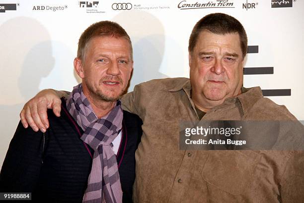 Actor John Goodman and director Soenke Wortmann attend the photocall of 'Pope Joan' at Hotel Ritz Carlton on October 19, 2009 in Berlin, Germany.