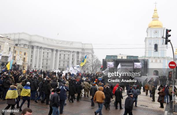 Supporters of former President of Georgia and former Odessa Governor Mikheil Saakashvili attend a march with demand of impeachment of Ukrainian...