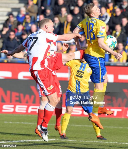 Toni Leistner of 1 FC Union Berlin and Georg Teigl of Eintracht Braunschweig during the second Bundesliga match between Eintracht Braunschweig and...