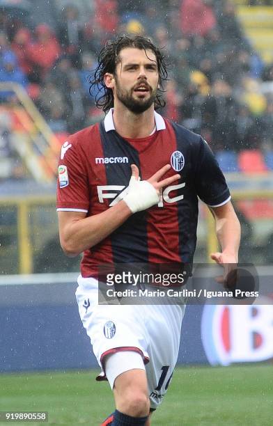 Andrea Poli of Bologna FC celebrates after scoring the opening goal during the serie A match between Bologna FC and US Sassuolo at Stadio Renato...