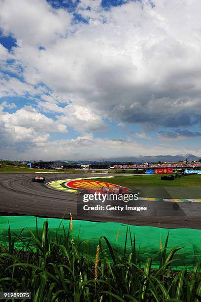 Kimi Raikkonen of Finland and Ferrari drives during the Brazilian Formula One Grand Prix at the Interlagos Circuit on October 18, 2009 in Sao Paulo,...