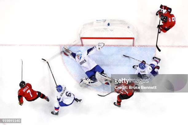 Gilbert Brule of Canada scores a goal against Matt Dalton of Korea in the third period during the Men's Ice Hockey Preliminary Round Group A game on...
