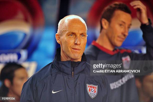 Coach Bob Bradley looks on his players on August 20 at the Mateo Flores stadium in Guatemala City, during a Concacaf qualifier football match against...