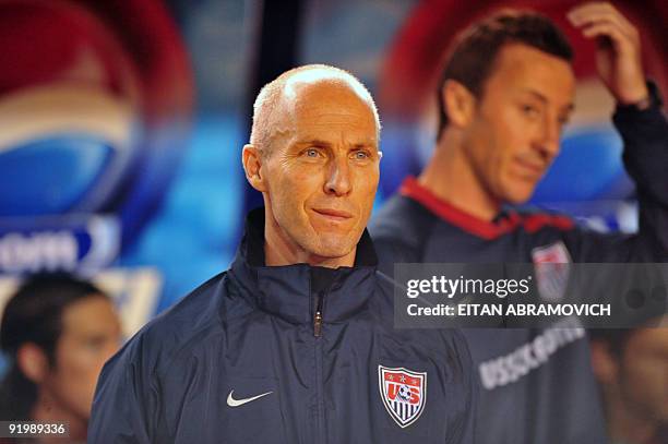 Coach Bob Bradley looks on his players on August 20 at the Mateo Flores stadium in Guatemala City, during a Concacaf qualifier football match against...