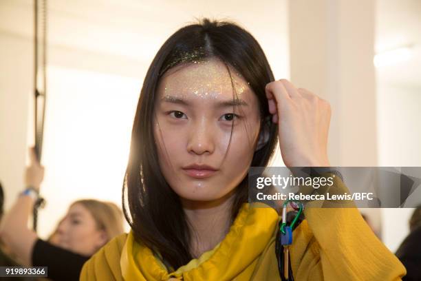 Model backstage ahead of the Preen by Thornton Bregazzi show during London Fashion Week February 2018 at on February 18, 2018 in London, England.
