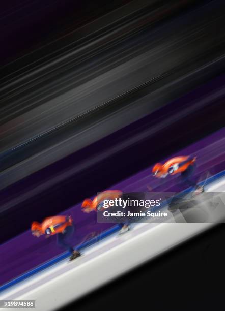 Sven Kramer, Jan Blokhuijsen and Koen Verweij of the Netherlands compete during the Men's Team Pursuit Speed Skating Quarter Finals on day nine of...